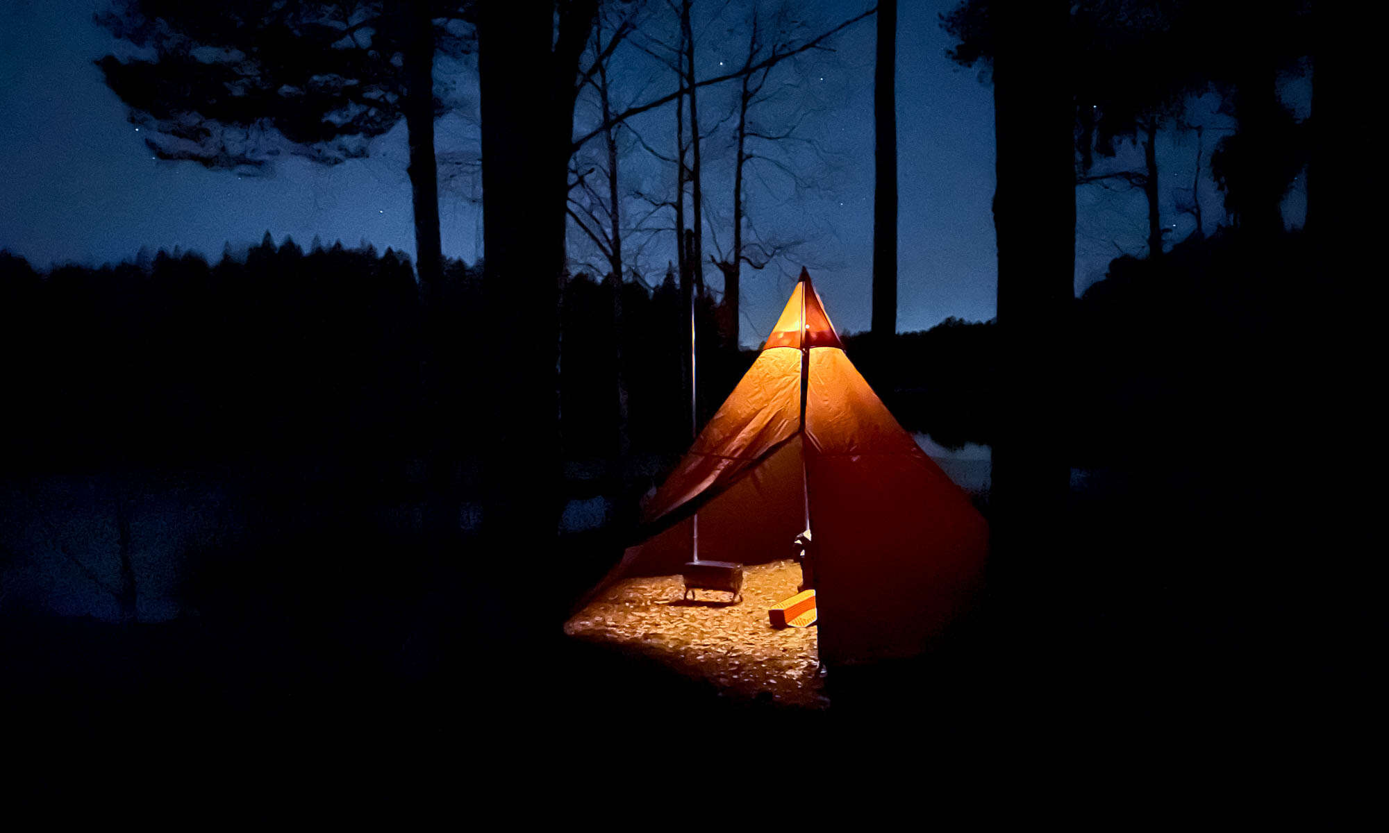 Hot tent winter camping in Nuuksio National Park near Helsinki