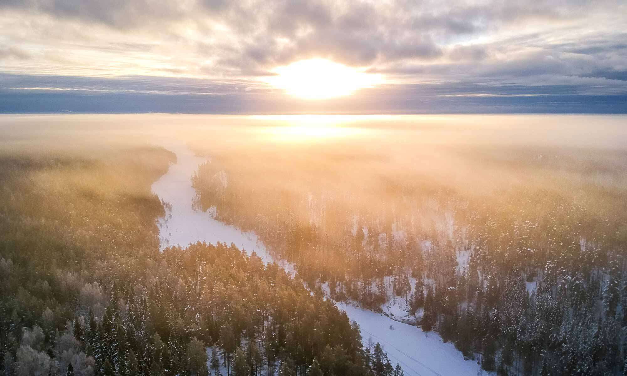 Nuuksio National Park in winter. Stunning winter view over Nuuksio National Park from a drone. Finnish nature near Helsinki, Finland.