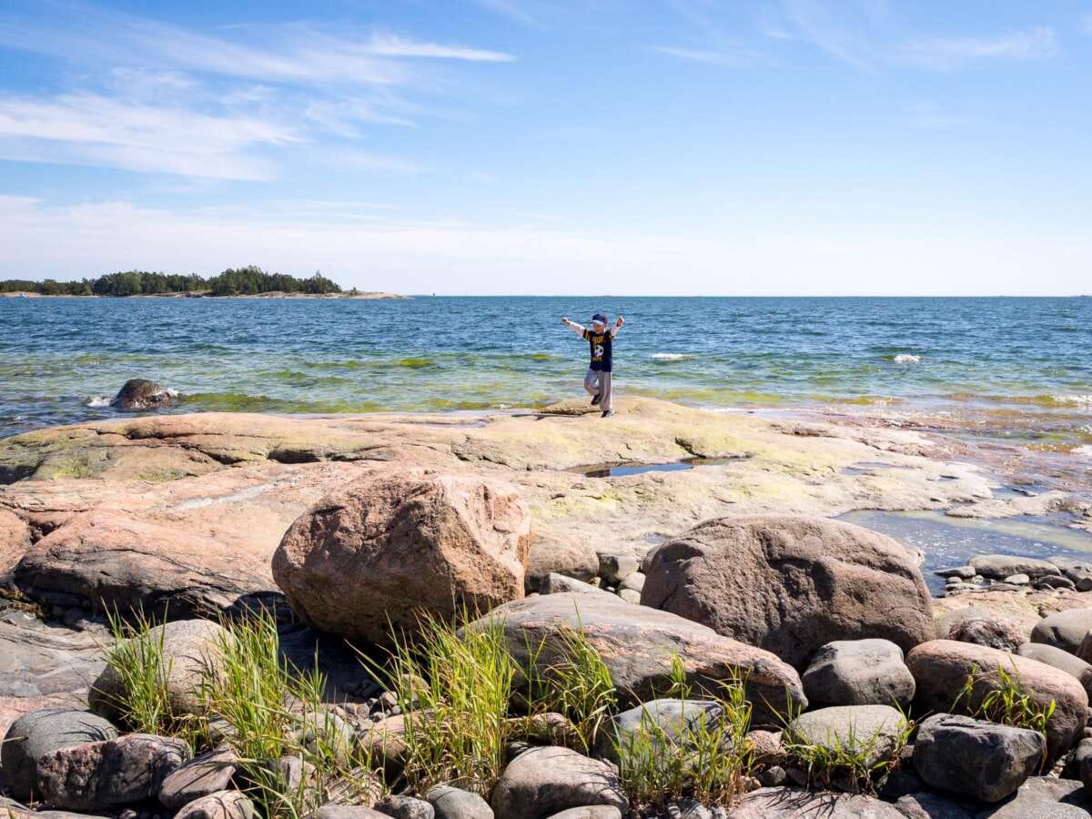 Archipelago by Helsinki in summer, in June. Relaxed day by the sea with children. Finnish nature near Helsinki, Finland.