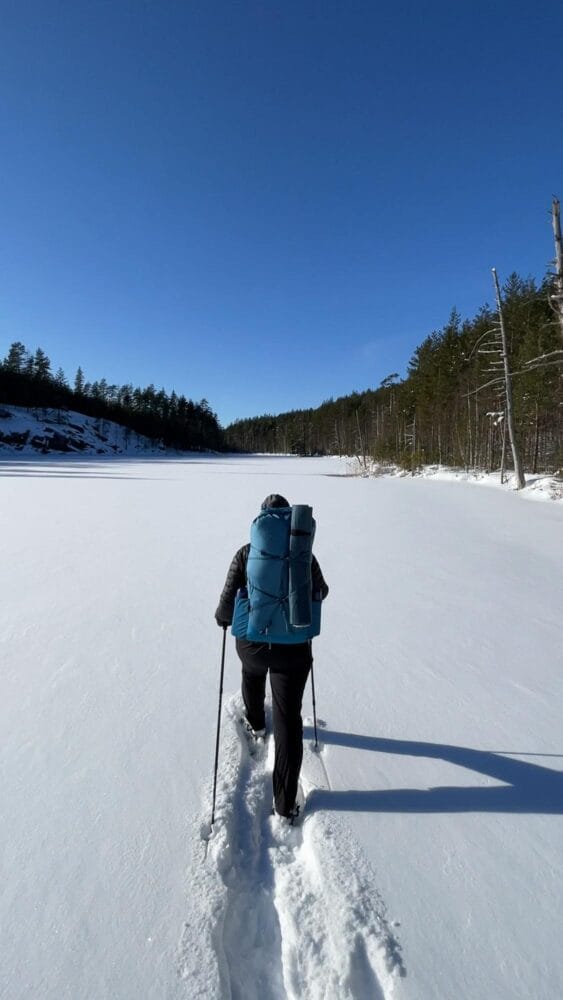 Hiker snowshoeing in Nuuksio National Park