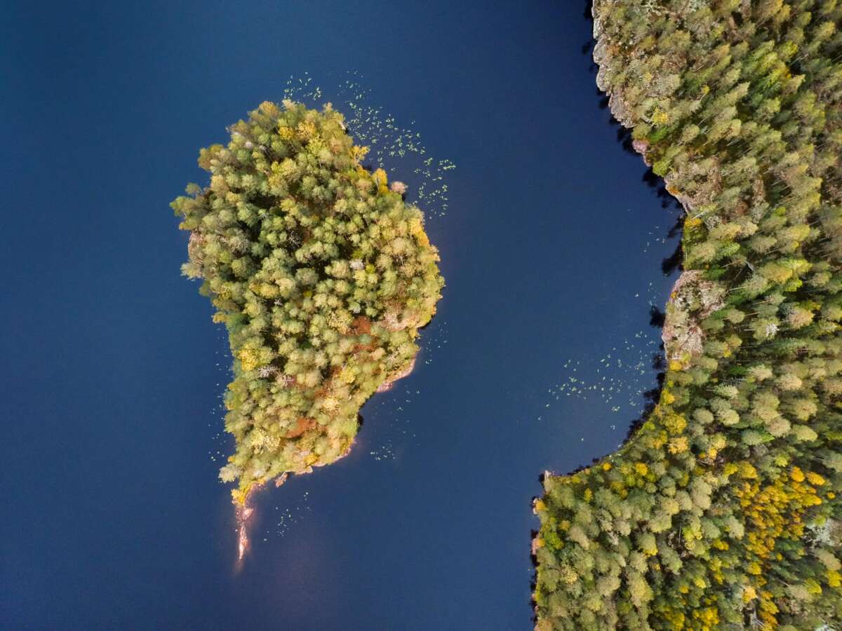 Nuuksio National Park in fall in September. Aerial photo of an island. Nature near Helsinki, Finland.