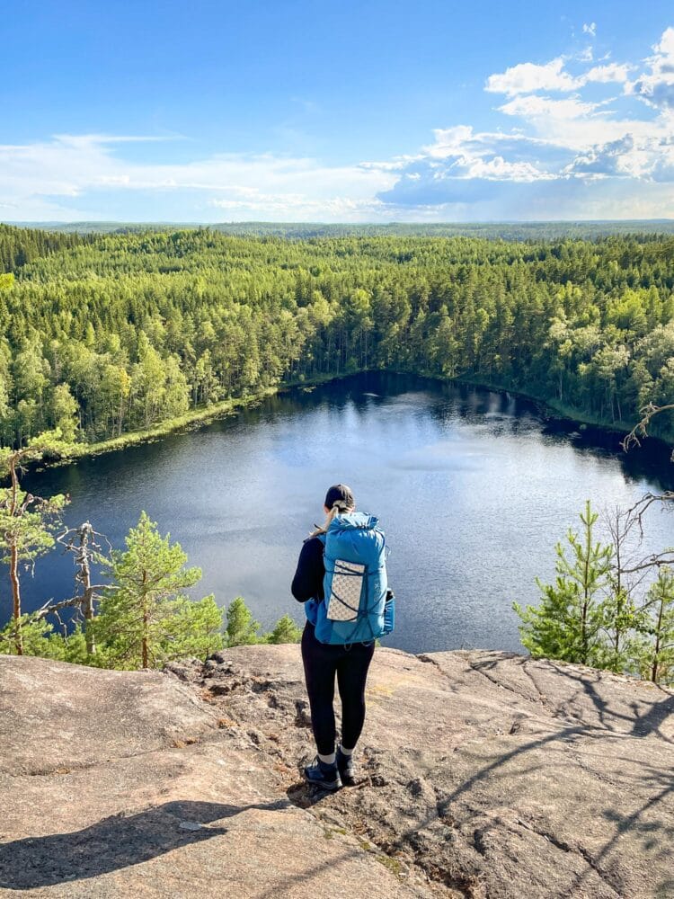 Hiker admiring the view at Olhava in Repovesi National Park